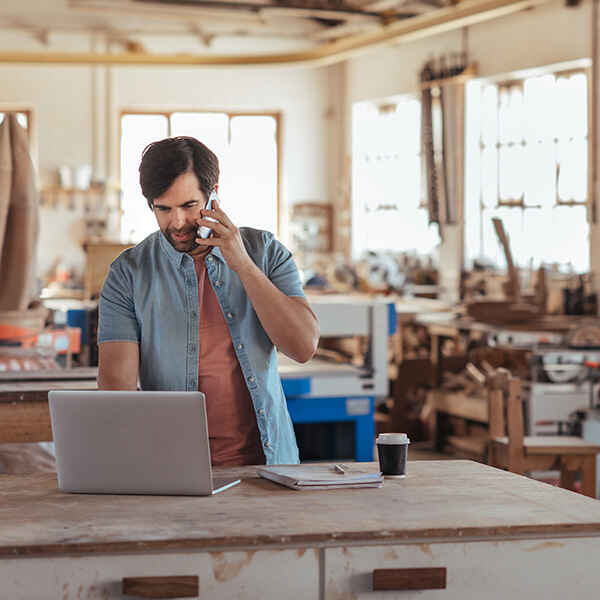 small business owner on phone